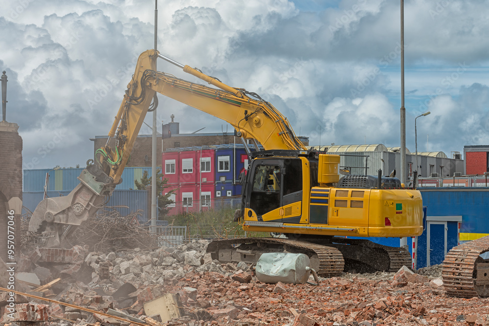 yellow steel demolition machine on steel tracks