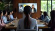 © Lucija - indian businesswoman in video conference with diverse team rear view