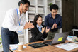 © Kritdanai - Virtual Celebration: A jubilant business team applauds a successful online presentation, highlighting the power of remote collaboration and digital communication in the modern workplace.