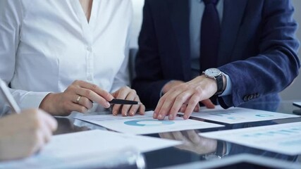 Wall Mural - Business people having meeting discussing contract details. Diverse group team, close up