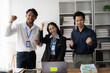 © Kritdanai - Business Team Celebrating Success: Diverse team of colleagues raise their fists in triumph, celebrating a successful project or milestone. Their smiles and shared excitement capture the essence of tea