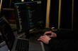 © Misha Onyshkiv/Stocksy - Software Developer Coding on Multiple Screens