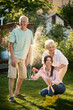 © Iuliia Versta/Stocksy - happy family on a green backyard
