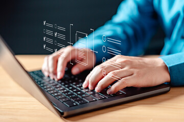 office, desktop, communication, technology, notebook, virtual, application, information, data, keyboard. A person is typing on a laptop with a screen showing a keyboard and a hand typing.