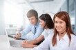 © BillionPhotos.com - Business people at work in call center and telemarketing