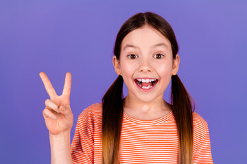 Sticker - Photo portrait of lovely small girl shown v-sign dressed stylish red garment isolated on violet color background