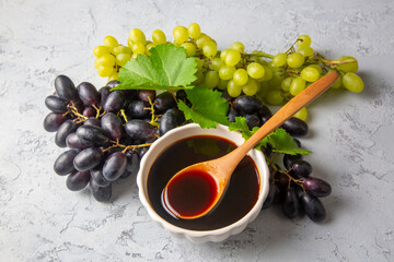 Grape molasses and fresh organic grapes