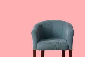 Wall Mural - Soft armchair on pink background