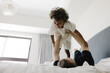 © Tanya Yatsenko/Stocksy - Father and son having fun