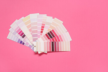 Poster - Many color palettes on pink background, top view