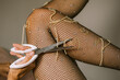 © Alina Hvostikova/Stocksy - Cutting Spaghetti From Fishnet Tights