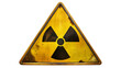 © OKAN - Warning Symbol for Radioactive Material Displayed on an Aged Yellow Background