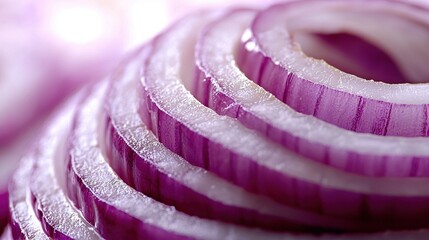 Poster -   A close-up photo of a slivered onion on a white dish with a pink and white spiral