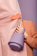 © Ulas&Merve/Stocksy - Stylish Woman Holding Trendy Purple Handbag