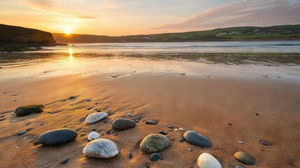   A cluster of boulders perched atop a seashore adjacent to a tranquil expanse of water, framed by an awe-inspiring sunset