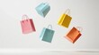 © Business Pics - Colorful shopping bags and boxes floating in the air, symbolizing online shopping, retail therapy, and sales excitement on a white background.