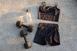 © Colour Laboratory/Stocksy - Ready to sport/training: water bottle, dumbbell and sports clothes