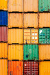 © J.R. PHOTOGRAPHY/Stocksy - A Wall of Shipping Containers at a Port