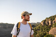 © Alba Vitta/Stocksy - Man enjoying freedom in mountains