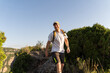 © Alba Vitta/Stocksy - Hiker in nature