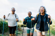 © BONNINSTUDIO/Stocksy - Three senior women hiking together on sunny day