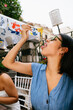 © Mal de Ojo Studio/Stocksy - Woman Enjoying Pasta Outdoors