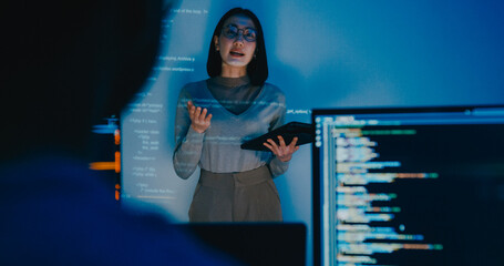 Group adult Asia female software developer mentor leader manager talk strategy plan to executive write prompt AI bot IT app program nomad, video game, designer, data center. Projecting slideshow code.