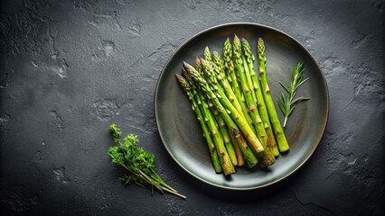 Wall Mural - Asparagus with thyme served on a sleek black plate against a dark background, asparagus, thyme, herb, vegetable, healthy, organic