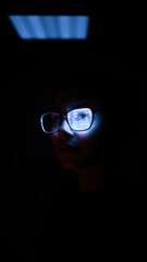 Wall Mural - person wearing glasses with digital numbers reflecting in the lenses