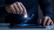 © AI Studio - Businessman Using Tablet with Glowing Financial Graph