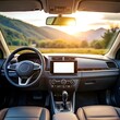© Ehtisham - A sunny and inviting view of a car's interior with a blank touchscreen display.
