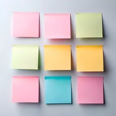 Sticker - A set of nine colorful sticky notes in various hues of pink. yellow. blue. and green arranged in a grid pattern on a white background.