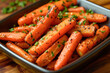 © kossovskiy - Honey garlic butter roasted carrots with herbs