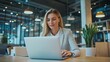 © CYBERUSS - Businesswoman working on a laptop in an office. Its professional and productive atmosphere, Confident female manage in Modern office