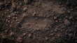 © Jrprr - dark brown soil background top view