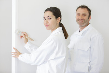 female and male renovating a home