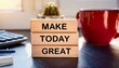 © l1gend - Wooden blocks with words 'Make today great'.