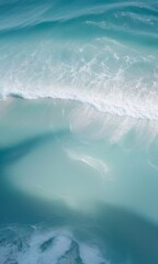 Wall Mural - Serene Ocean Waves: Close-up of Blue-Green Water with White Foam