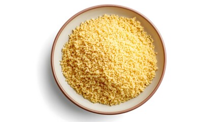 Top view of couscous in a ceramic bowl on white background