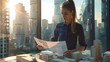 © liliyabatyrova - A woman is sitting at a desk reading a newspaper