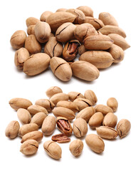 Wall Mural - Peeled pecan nuts closeup, isolated on white background