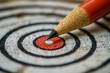 © VISA-3UK - Bullseye: A sharpened red pencil strikes the center of a target, symbolizing precision, focus, and achievement.
