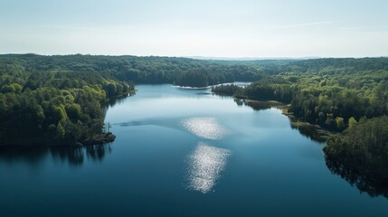 Wall Mural - Lakes serve as important reservoirs for freshwater, supporting both human needs and wildlife habitats.