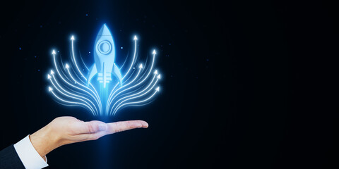 Poster - Close up of man hand holding creative glowing rocket spaceship and arrows hologram on dark blue background with mock up place. Start up, launch, social media, network and connection concept.