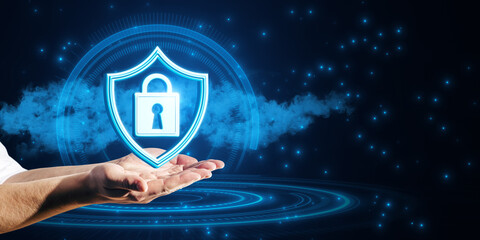 Wall Mural - Close up of businessman hands holding glowing padlock and shield on cloud hologram. Blurry blue background. Secure and protection concept.