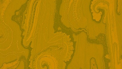 Abstract gold and green swirl pattern.