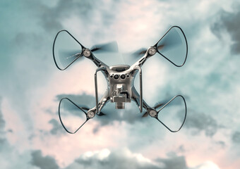 Wall Mural - Modern drone with a camera flies in the sky.