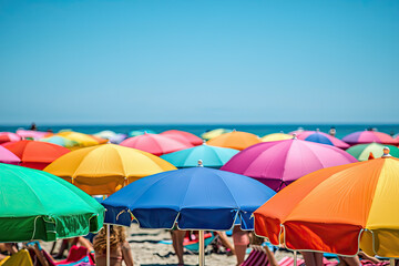 A vibrant symphony of colors on a sunny beach, as colorful umbrellas create a cheerful backdrop for a relaxing day by the sea.