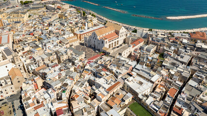 Aerial view of the Pontifical Basilica of Saint Nicholas in the old town of Bari, Puglia, Italy. It is a Catholic Church in the historic center of the city built in the Apulian Romanesque style.