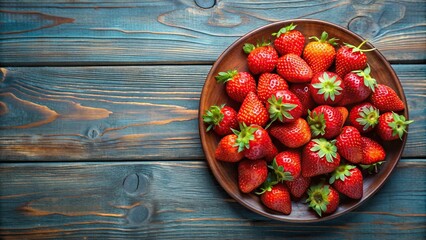 Wall Mural - summer, close-up, fresh, fruit, snack, vibrant, food photography, freshness, healthy, strawberries, red, plate, aerial view, dessert, organic, Fresh and tasty strawberries in a plate